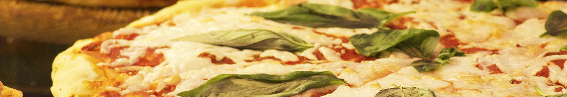 Eating Italian Pizza at Aldo's Pizza restaurant in Washington, MO.